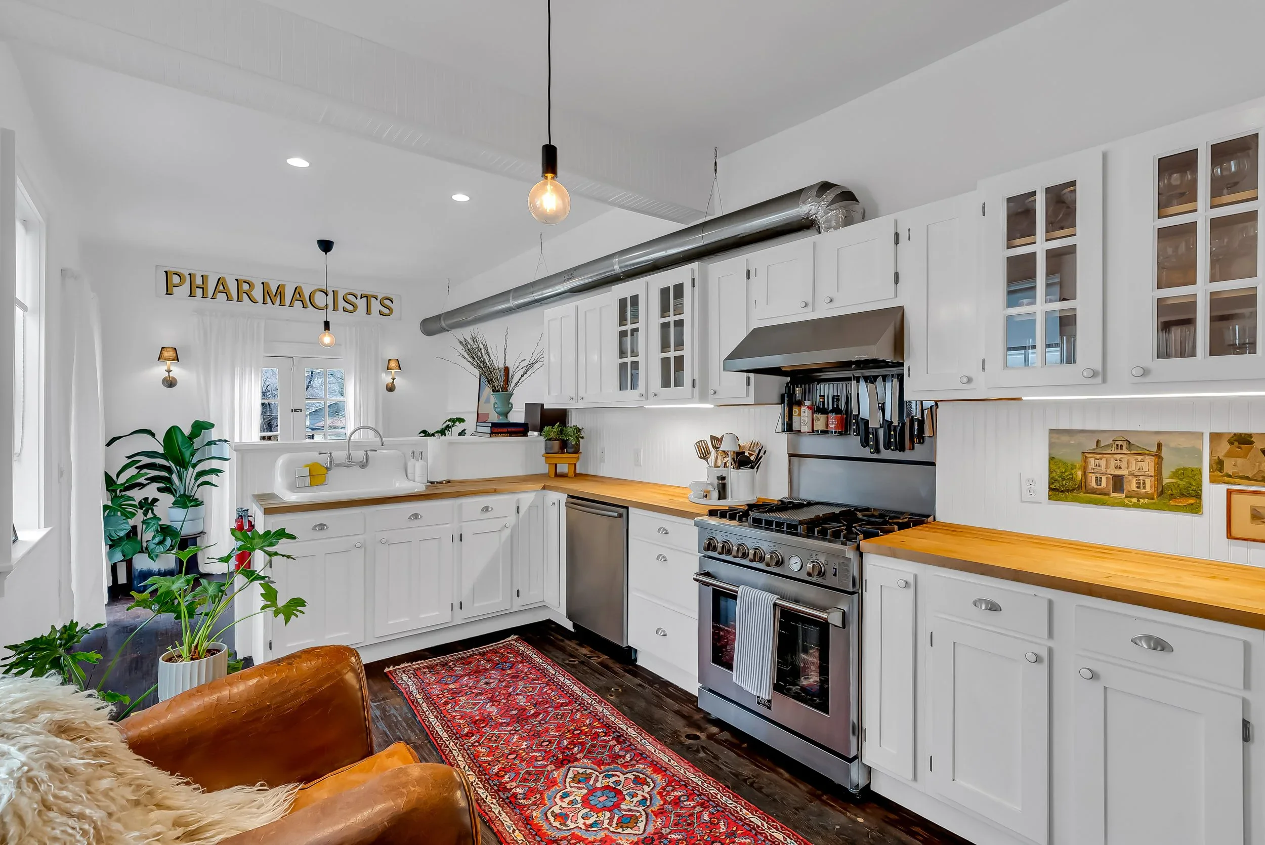 Bright, fully appointed kitchen with classic cabinetry and generous counter space